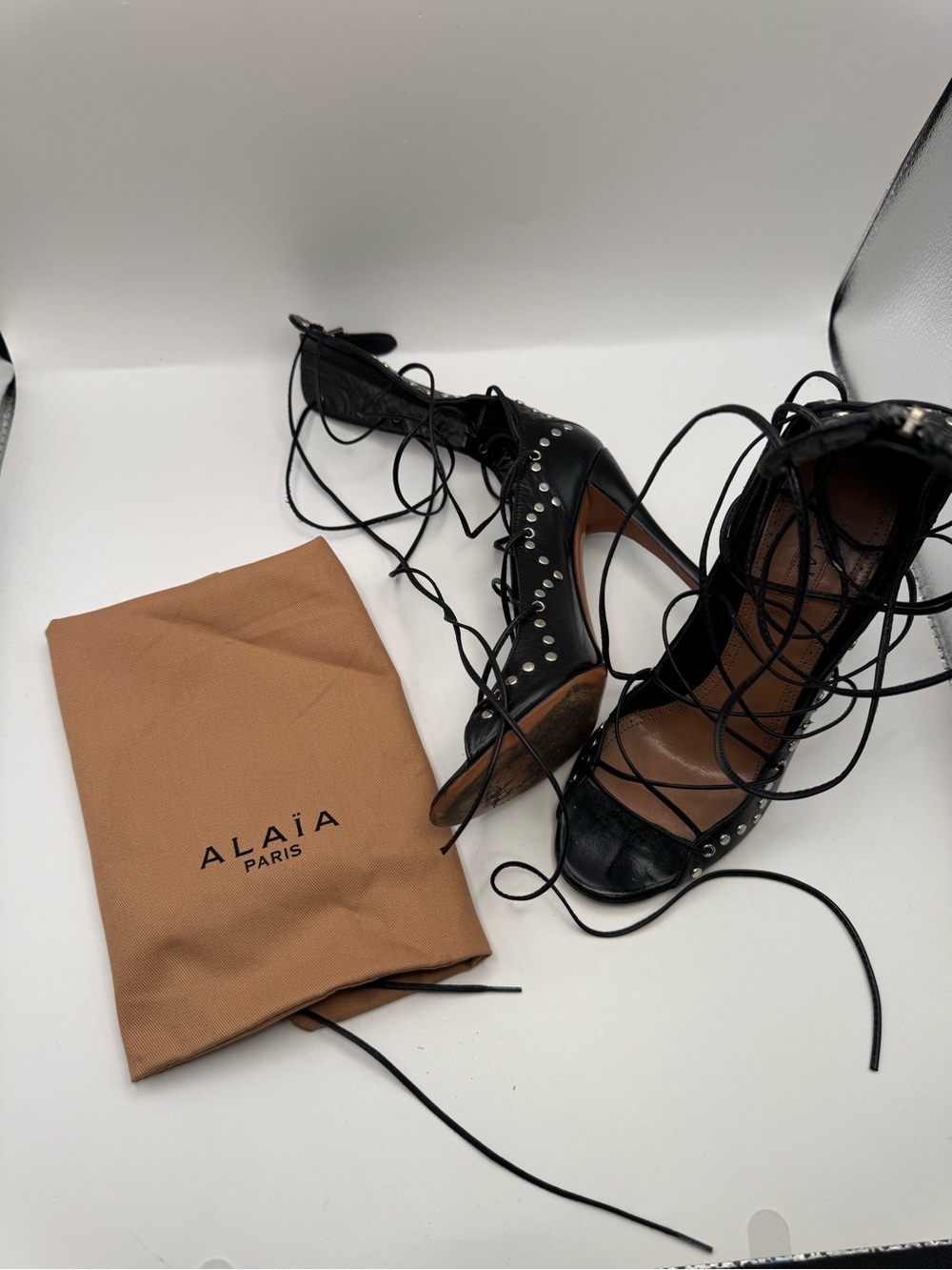 ALAÏA Paris Black Leather Studded Lace-Up Heels – EU 36